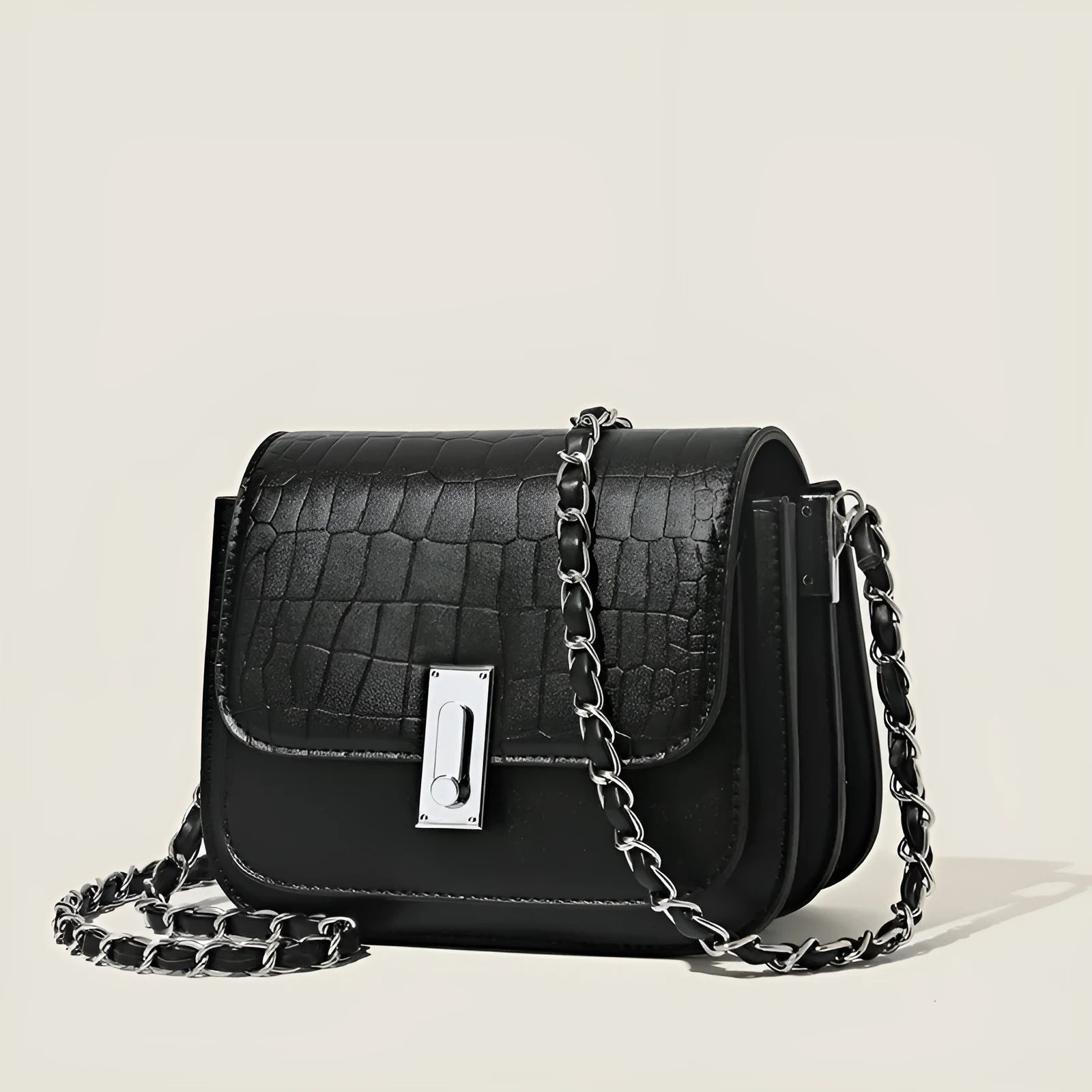 Women's black PU leather crossbody shoulder bag showing horizontal square shape and outer sandwich pocket