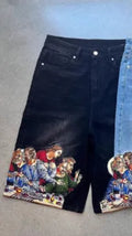 Blue men's cotton tapered shorts featuring a Jesus print on the back pocket.