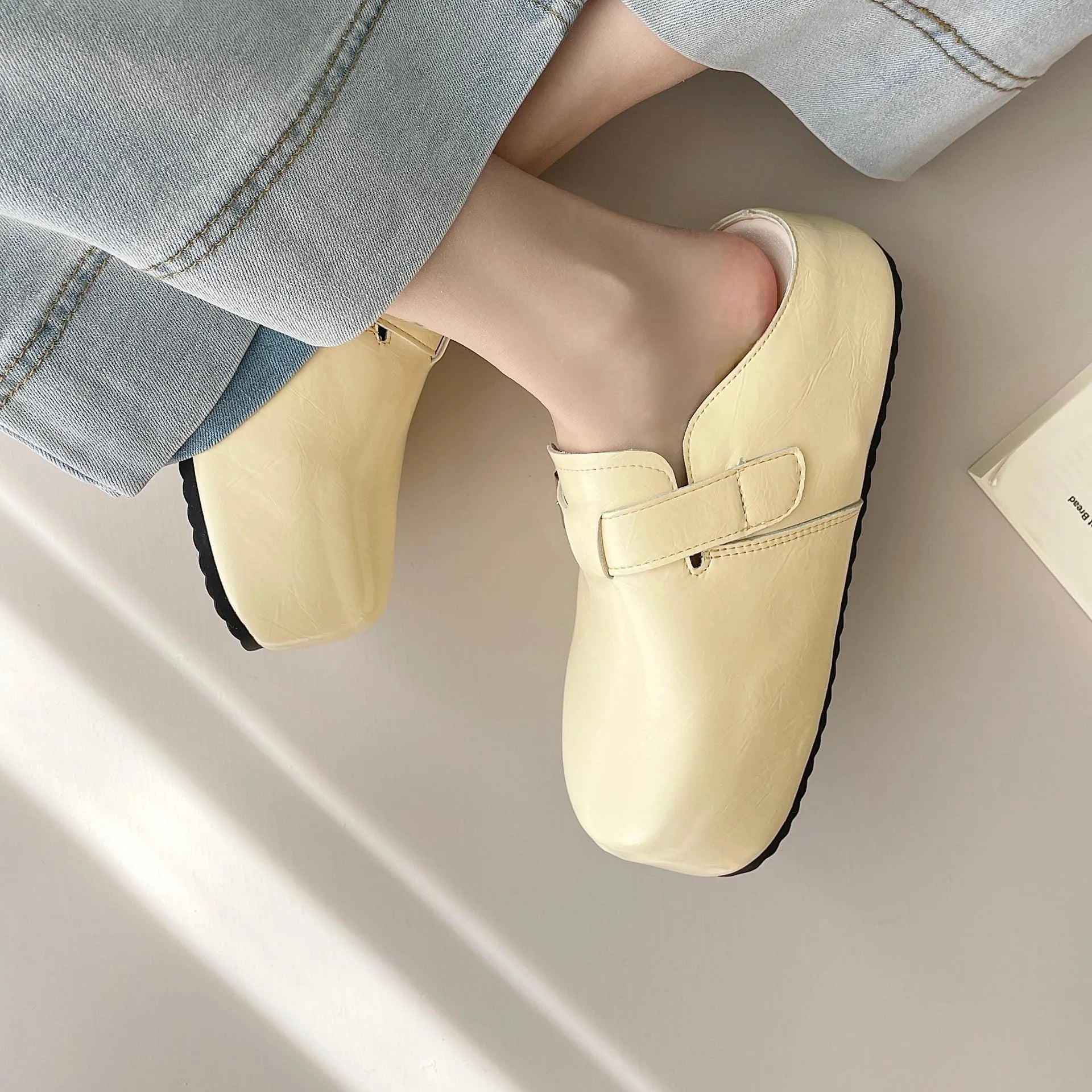 Flat buckle casual sneakers with round toe and PU leather upper in multiple colour options