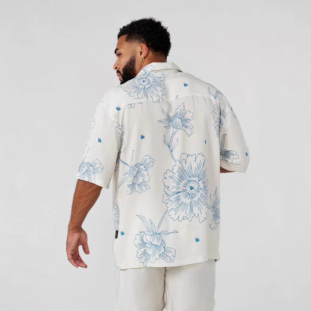 Men's loose-fitting floral printed cardigan-style top with short sleeves in light colour