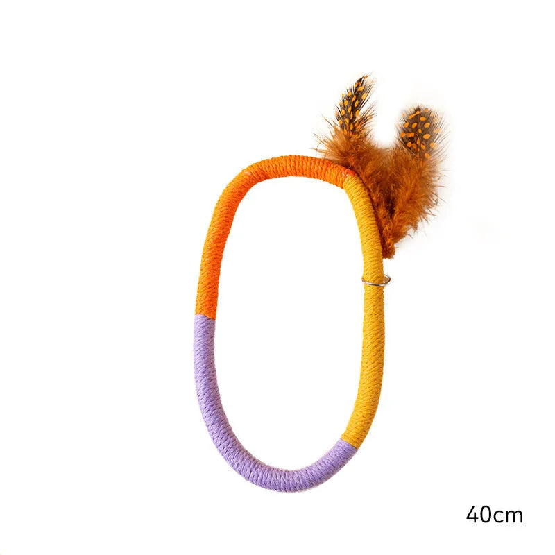 Green and purple cotton rope circular cat toys with feathers and catnip for indoor feline play
