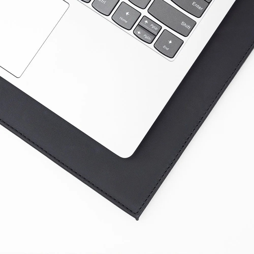 Heat-insulating anti-radiation printing tablet pad for laptops and digital tablets in blue colour on a wooden desk.