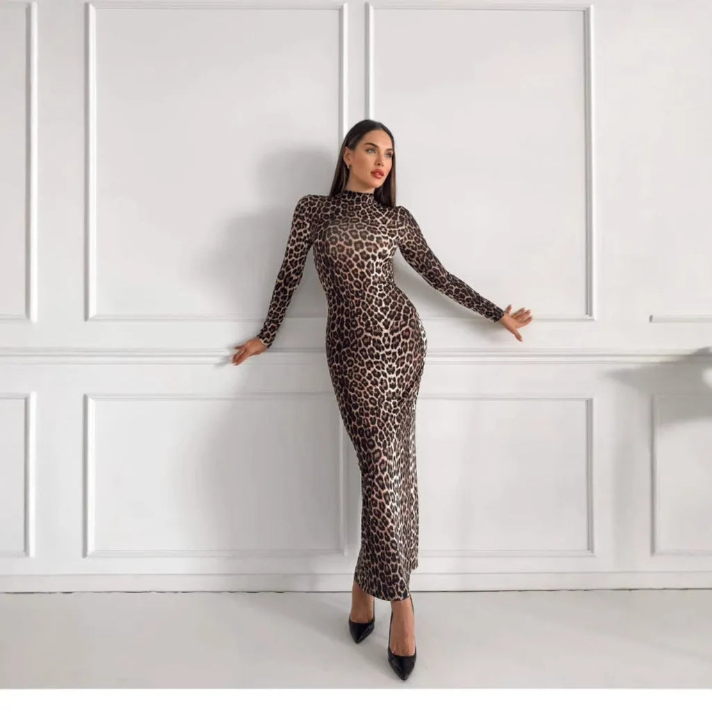 Leopard print long sleeve dress with stand collar and high-waisted knee-length skirt.