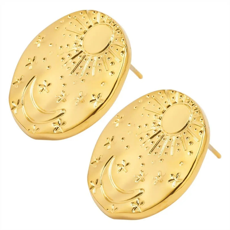 Pair of geometric stud earrings with shell design in gold or silver finish on a white background.