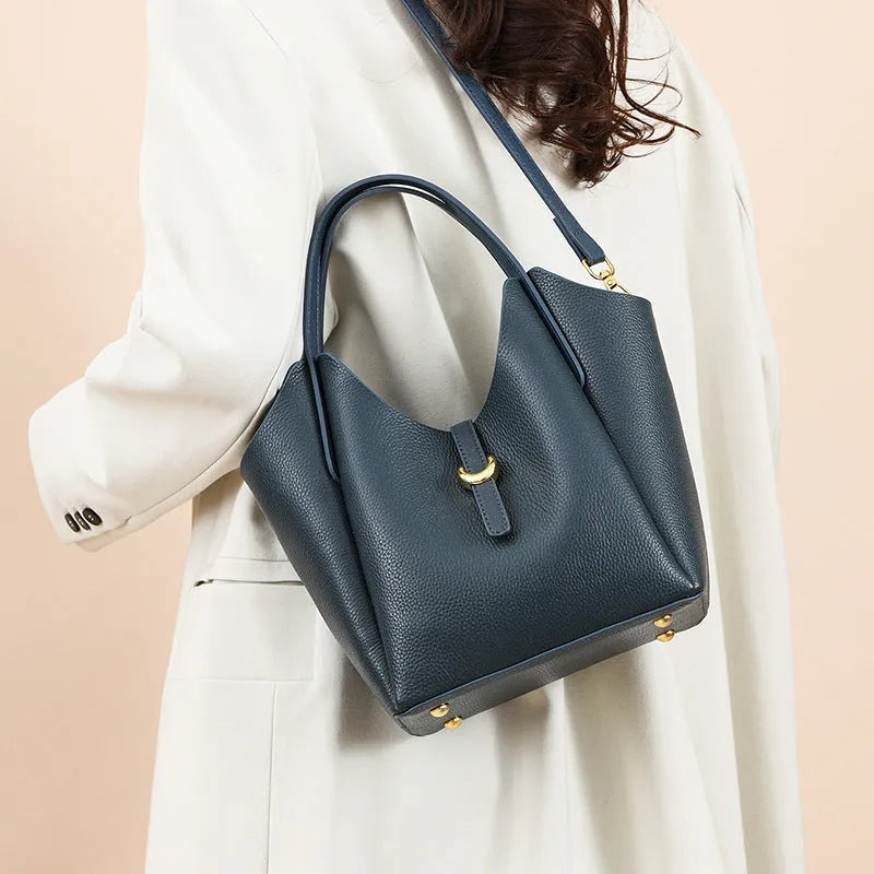 Genuine leather women's bucket bag in hand-held style with visible stitching details