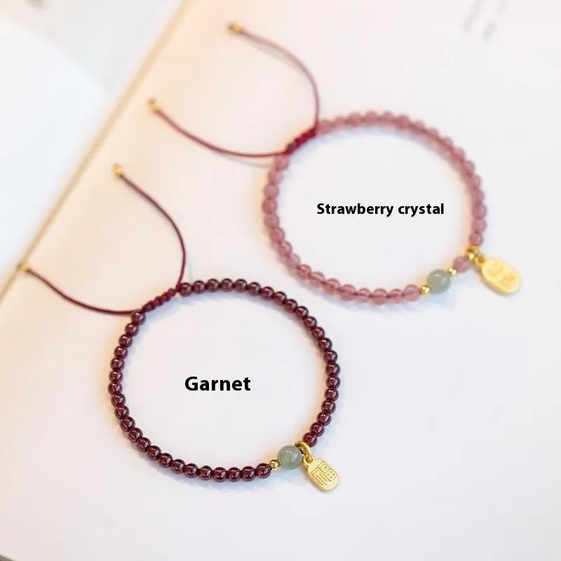 Red rope bracelet with strawberry quartz crystal and hand-woven construction for women