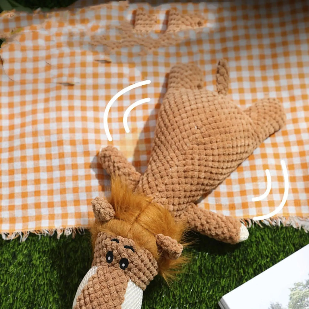 Green plush dog toy shaped like corn with textured kernel surface and squeaker inside