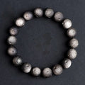Natural obsidian crater ball bracelet with textured beads in silver meteorite finish