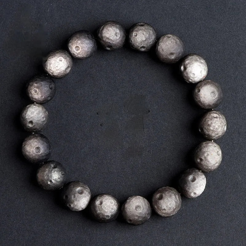 Natural obsidian crater ball bracelet with textured beads in silver meteorite finish