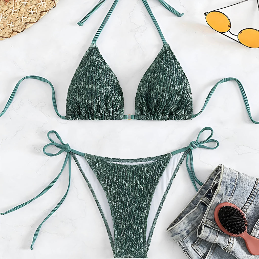 Women's green halter strap backless swimsuit with three-point design and matching shorts