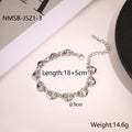 Hollowed-out heart women's bracelet in stainless steel with 18K electroplated finish showing geometric design