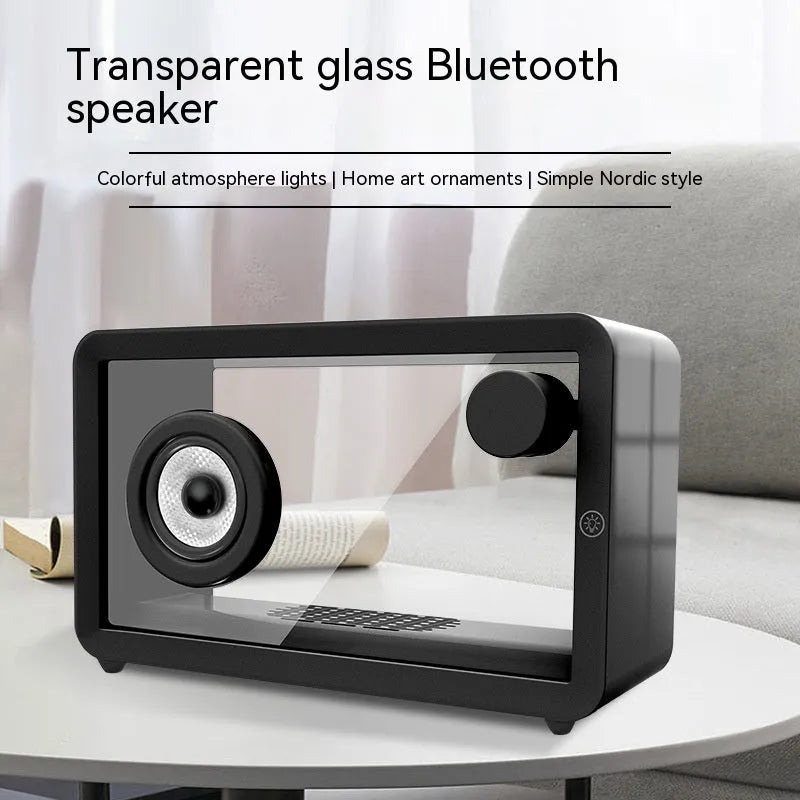 Transparent glass creative Bluetooth speaker in black on a desk with USB cable nearby