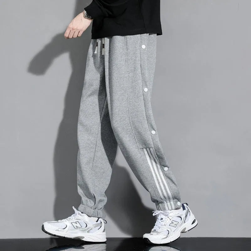 Men's black cotton blend sweatpants with belt and loose fit design for autumn sports wear