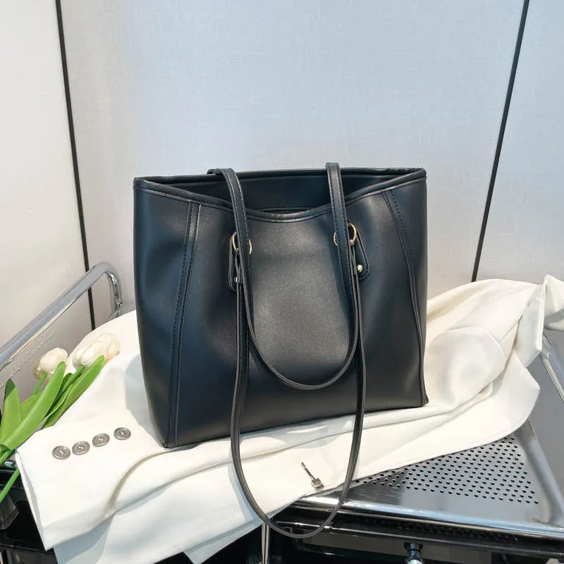 PU leather tote bag in urban simplicity style with internal organisation pockets