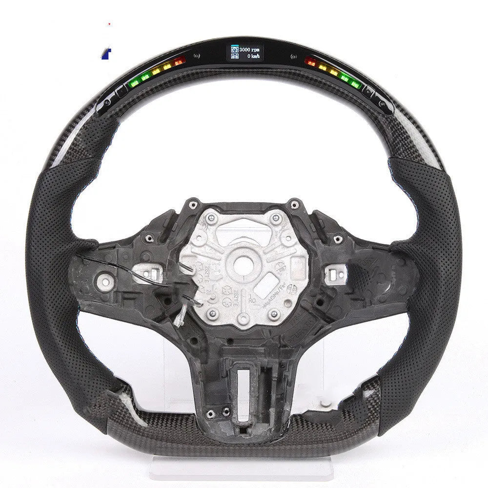 Black carbon fibre sports steering wheel with LED display for BMW X3 and X5 cars.
