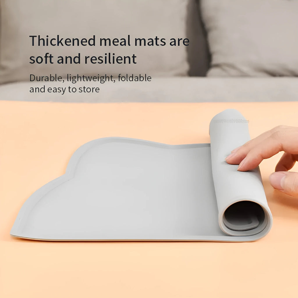 Blue silicone pet feeding mat measuring 44cm by 24cm under a dog bowl