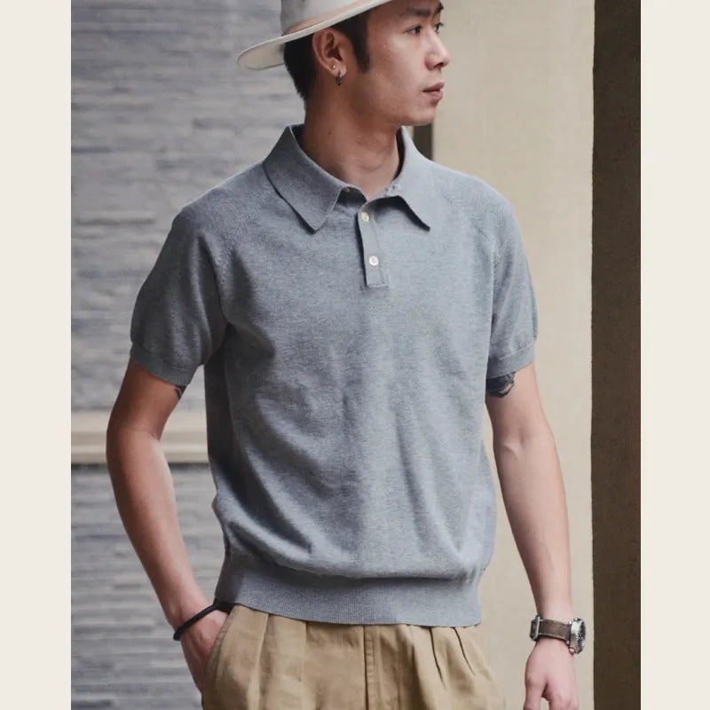 Retro slim fit short-sleeved cotton T-shirt shown in a solid colour on a hanger.