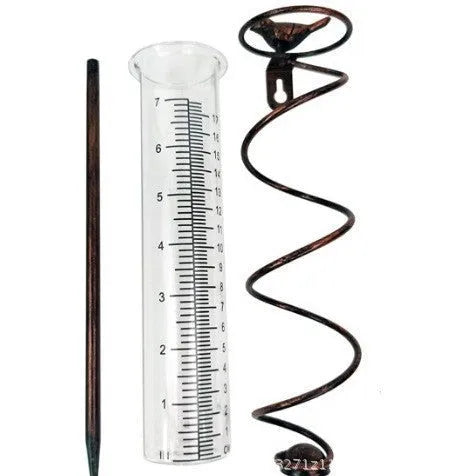 Cast iron hummingbird decoration garden rain gauge with glass measurement tube showing 1-20 scale