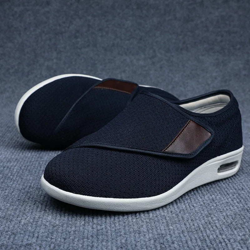 Leisure shoes for elderly with Velcro strap, textile and synthetic leather upper, round toe.