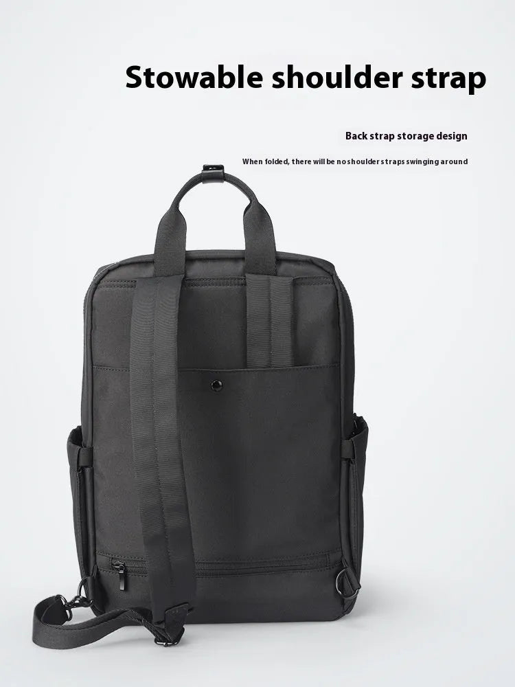 Elegant black Oxford cloth computer backpack with 20-35 litre capacity and polyester lining