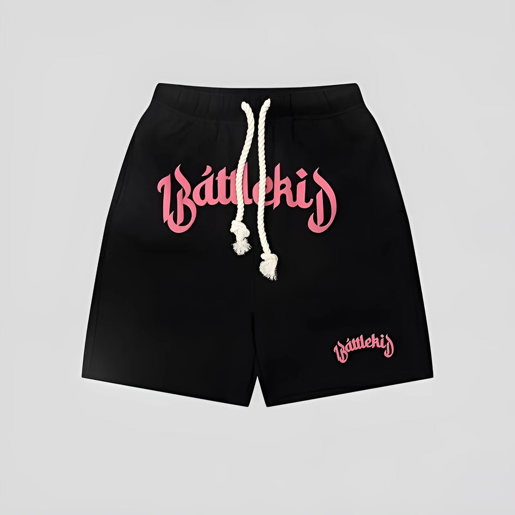 Men's loose cotton blend cropped shorts in grey, shown in a casual setting