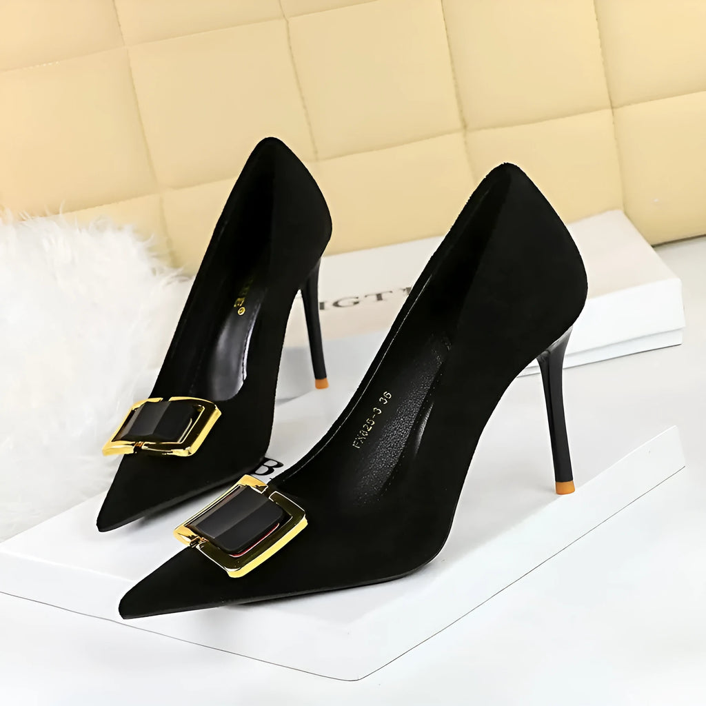 Black suede women's court shoes with a 9cm stiletto heel and pointed toe on a white background