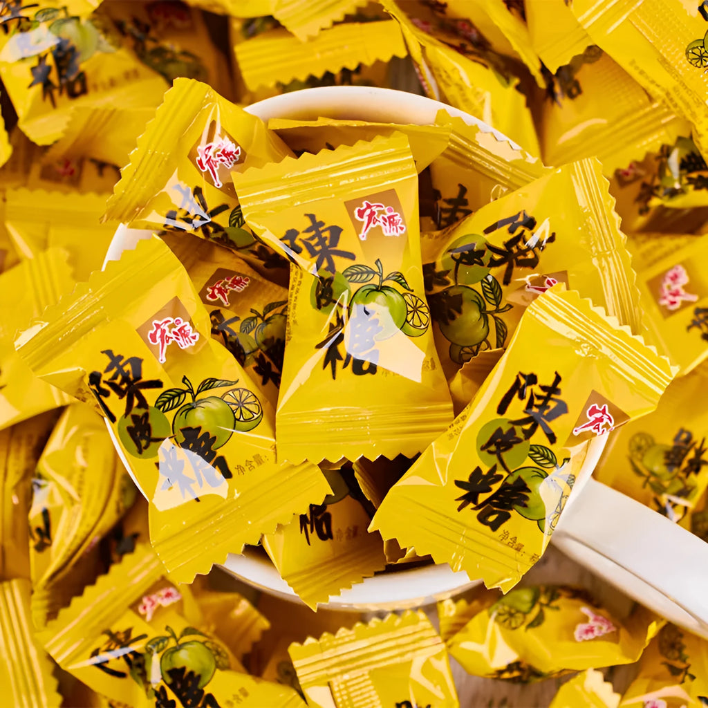 Bag of assorted hard candies: plum sugar, guava fruit flavour, and tangerine peel sweets.