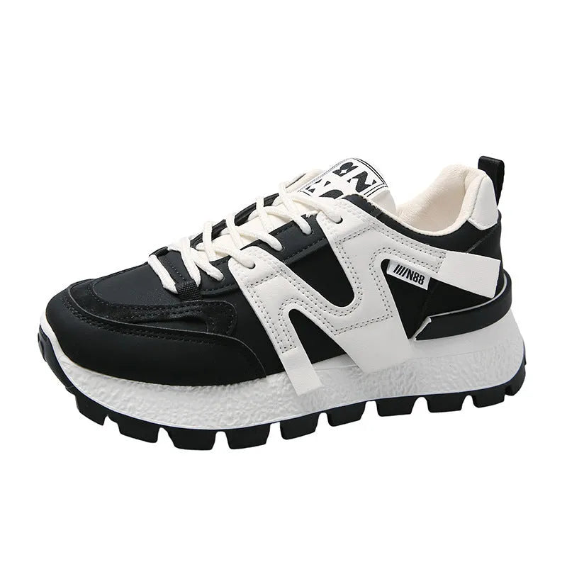 Low-top casual sneaker with artificial PU upper and rubber sole in black or white colour