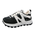 Low-top casual sneaker with artificial PU upper and rubber sole in black or white colour