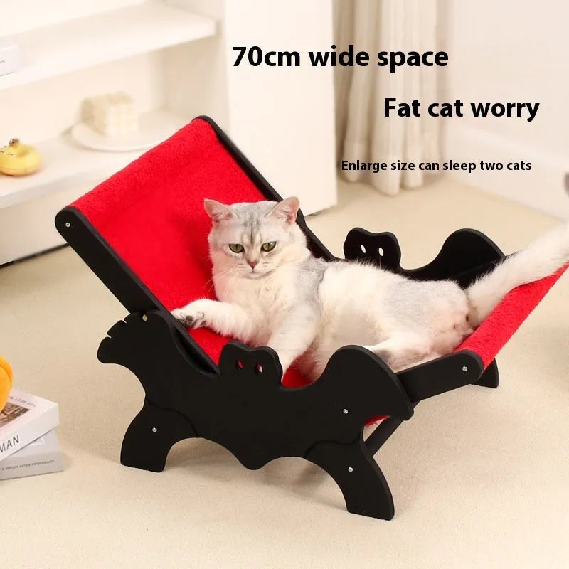 Solid wooden cat lounge chair with bat-wing Halloween design in black and red colours