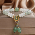 Green Tian Shan Cui abacus bead bracelet with retro butterfly tassel and pearl accents