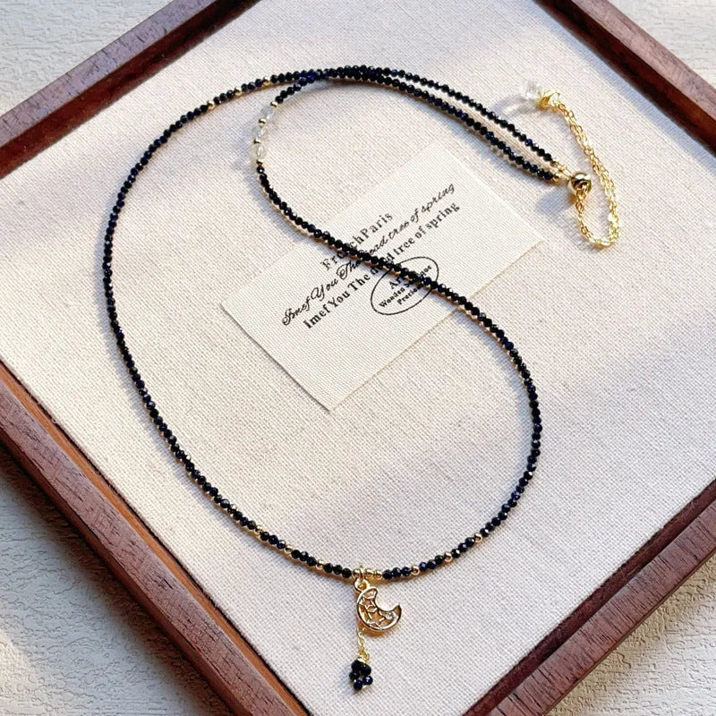 Blue sand stone three-ring multi-layer bracelet for women on a wrist.