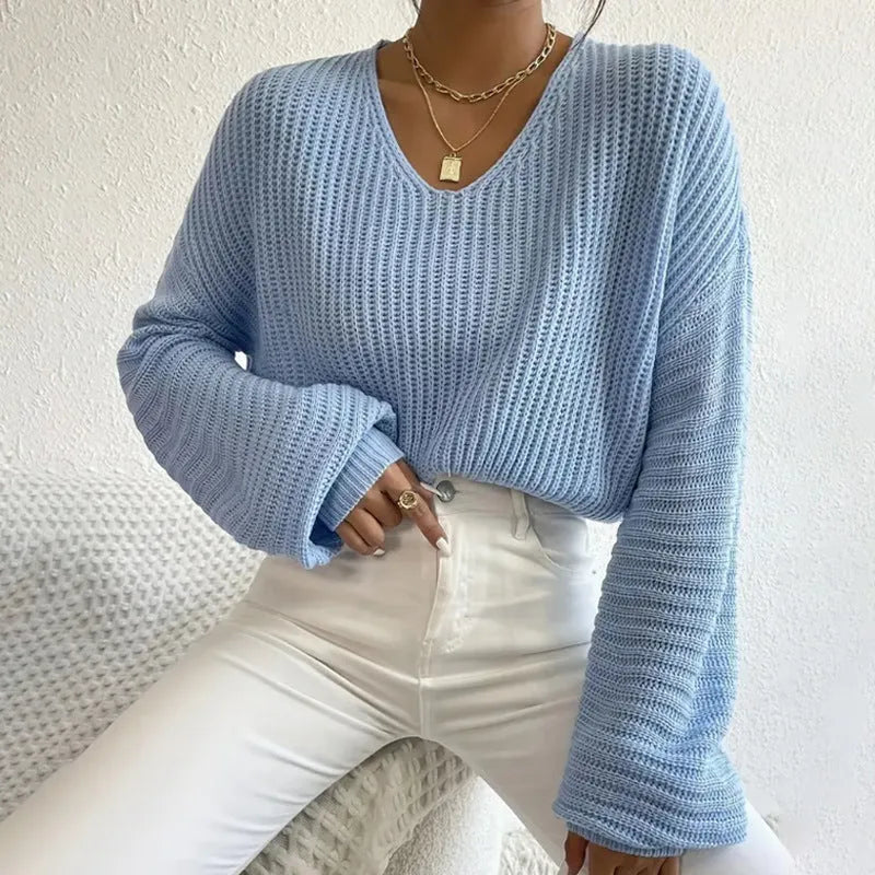 Solid colour long sleeve women's pullover in a loose casual fit, shown in one of five colour options.