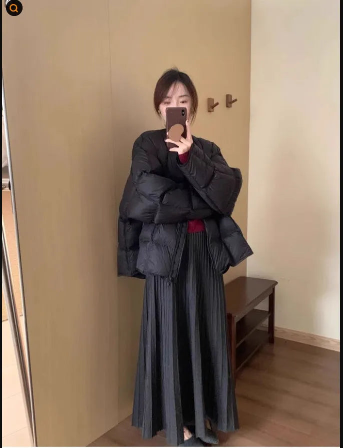 Dark grey knitted long dress suit with 3D texture, featuring a sweater and skirt in artistic retro style.