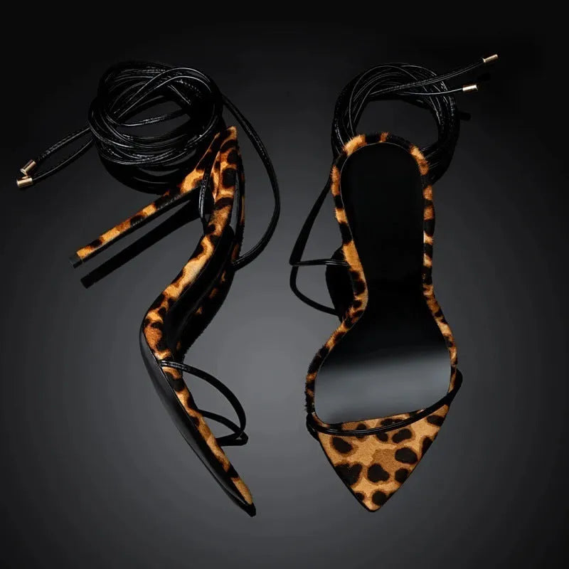 Women's leopard print Roman sandals with pointed toe and lace-up fastening on rubber sole