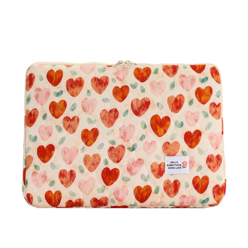 Cloth laptop bag in floral and heart patterns showing three size options with anti-seismic protection