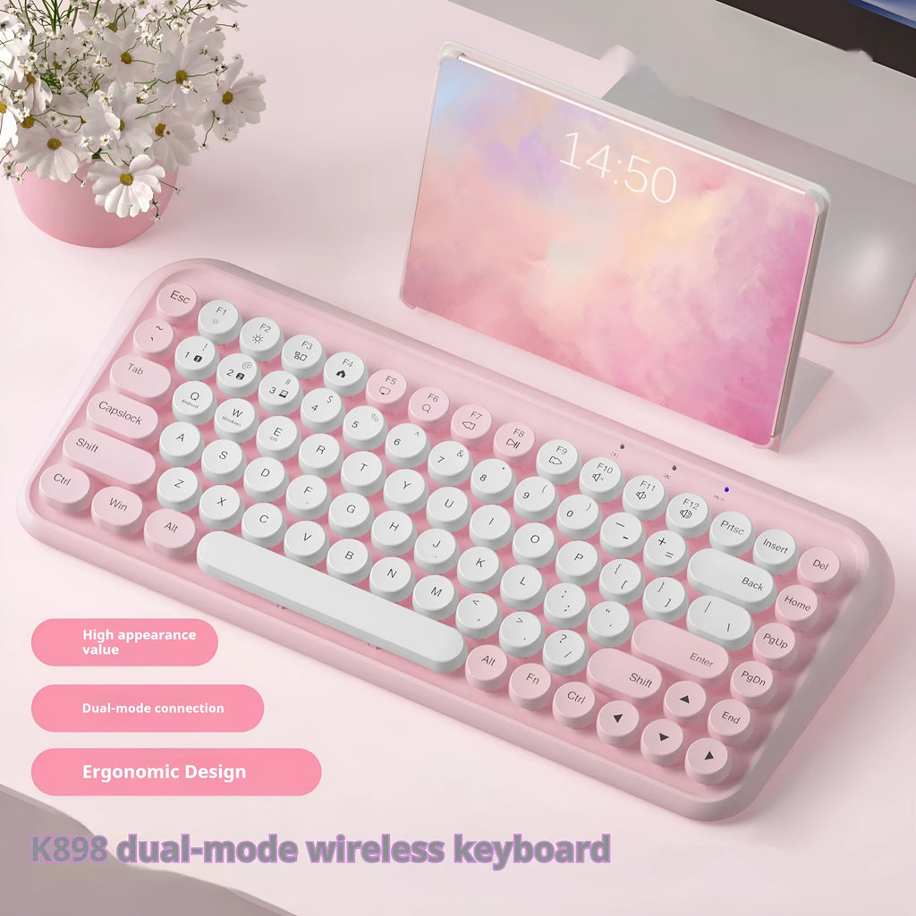 Pink wireless Bluetooth keyboard with mechanical keys and compact design