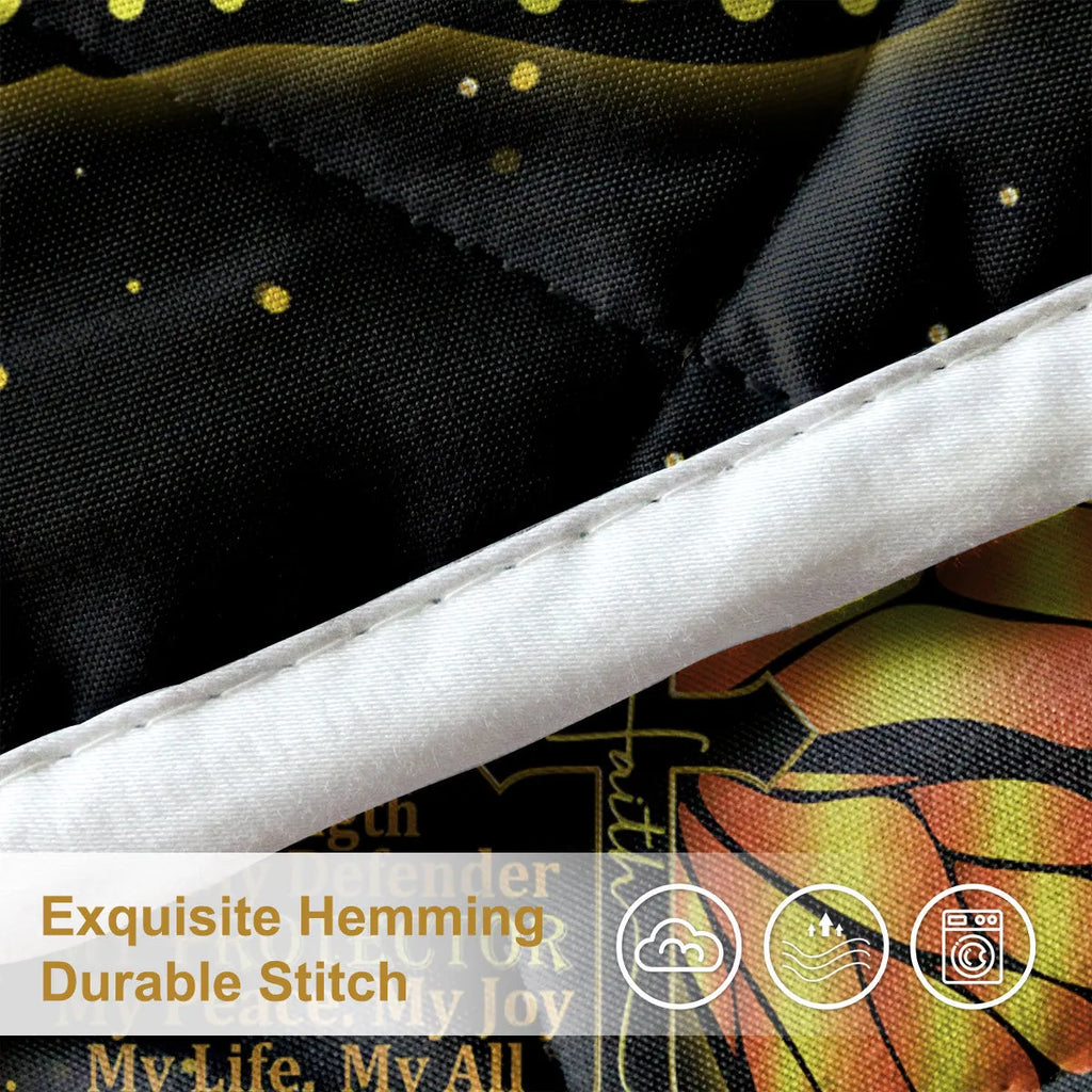 3-piece black quilt set with butterfly and sunflower 3D pattern on bed