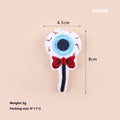 Small plush cat teaser toy with colourful candy or skull design on string
