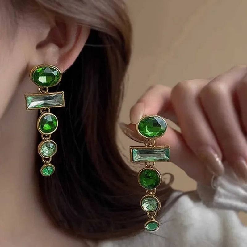 Green zircon and gradient tassel geometric alloy earrings in a retro Chinese style.