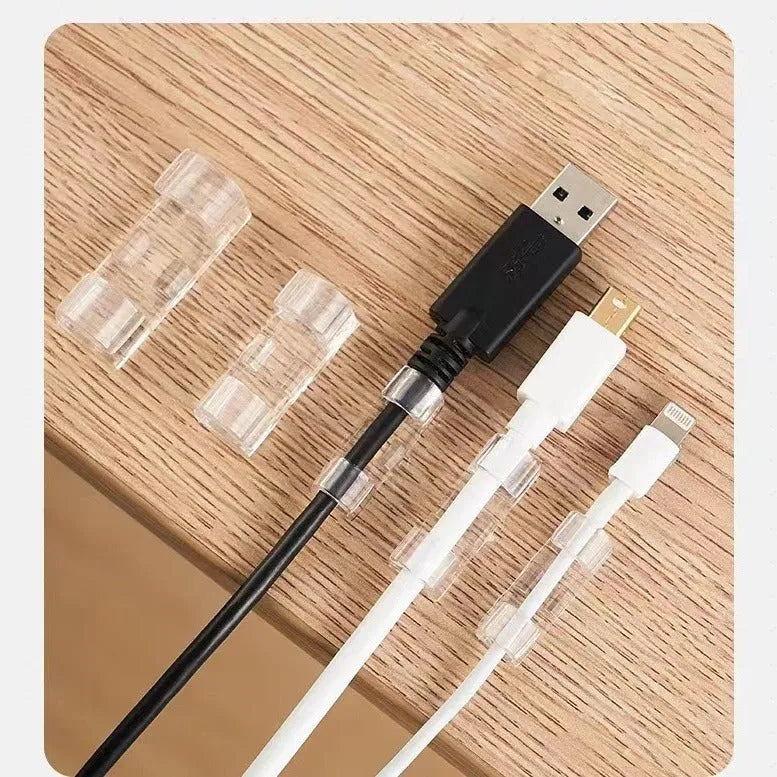 Transparent plastic self-adhesive cable routing clips in four sizes for wire organisation