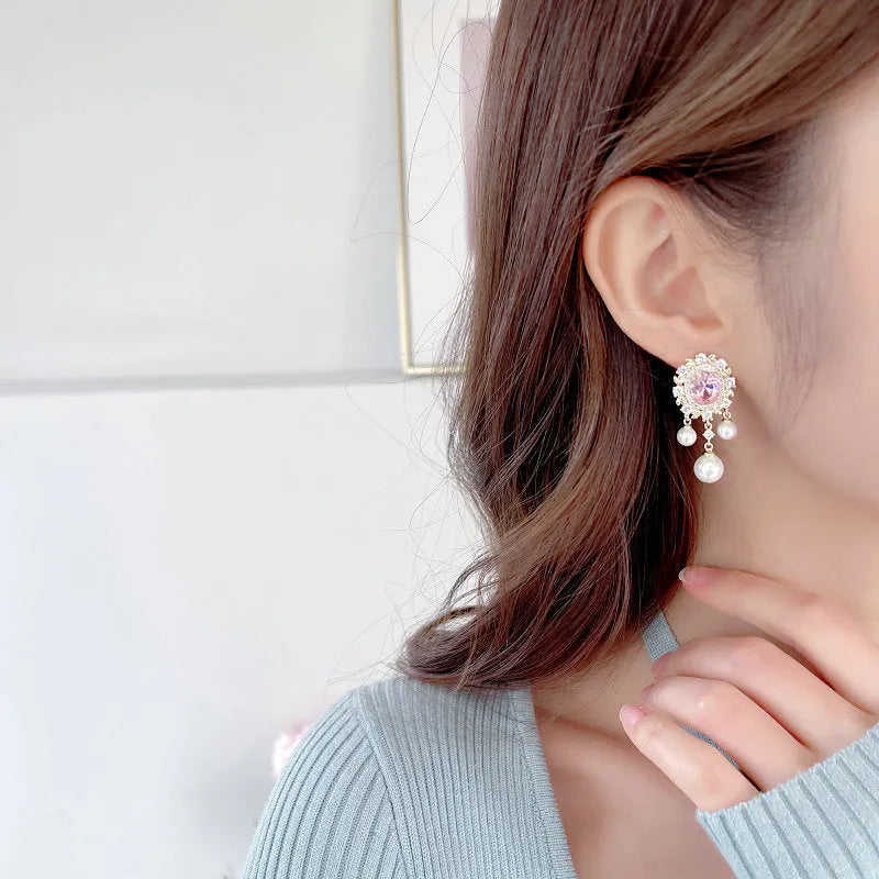 Oval geometric earrings with zircon inlay and pearl tassels in pink, blue, purple, and white colour options