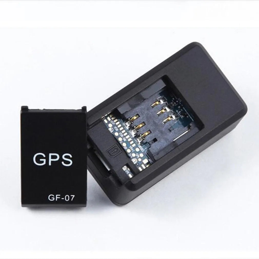 Black magnetic mini GPS tracker device with compact 35mm dimensions for vehicle tracking