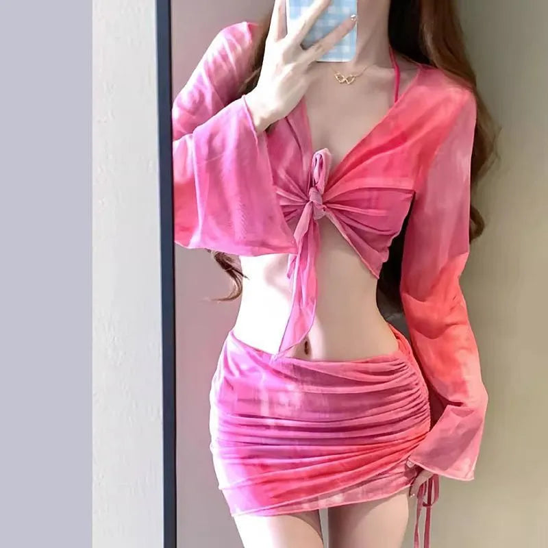 Women's blue high waist bikini four-piece swimsuit set with shirt, bra, underwear and skirt components