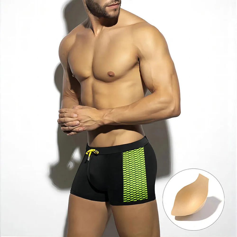 Polka dot print quick-dry swimming boxers in nylon, shown in available colours and sizes for sports.