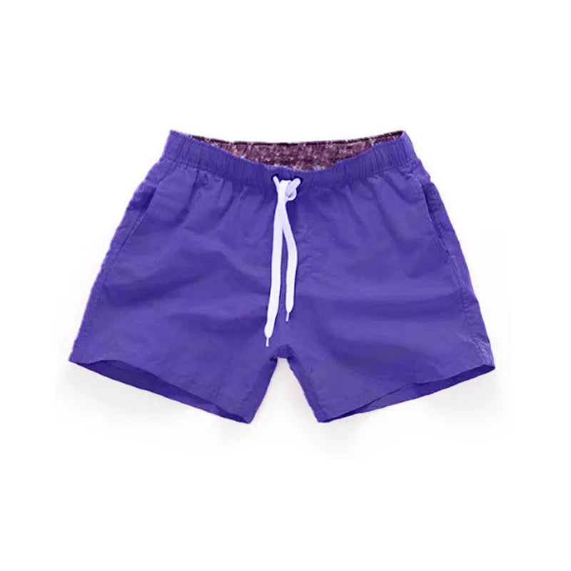Men's straight leg beach shorts in polyester fabric for surfing and swimming