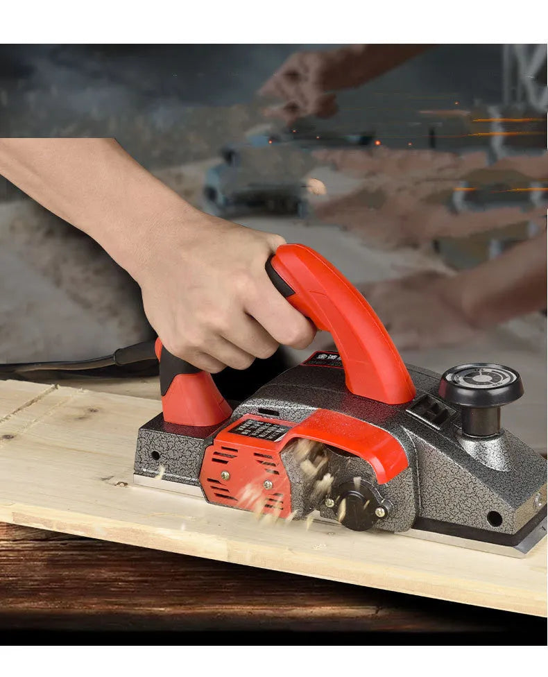 Red desktop electric wood planer with 82mm width and aluminium housing