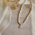 French Court vintage geometric pearl necklace made from alloy with adjustable length.