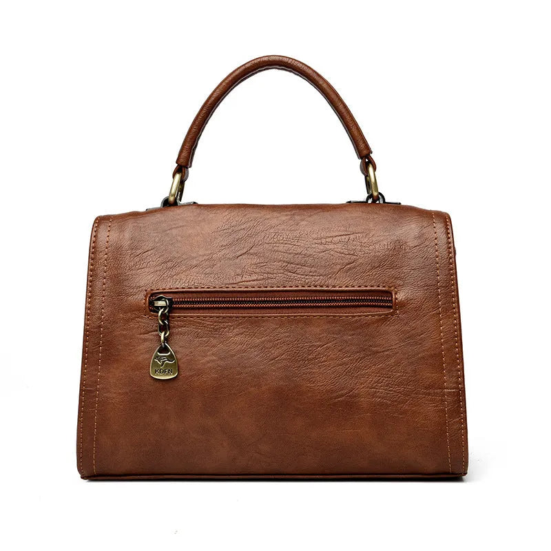 Gray soft PU leather women's crossbody bag with a horizontal square shape and a front sandwich pocket.