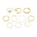 Gold openwork floral pattern alloy ring with electroplated glossy finish